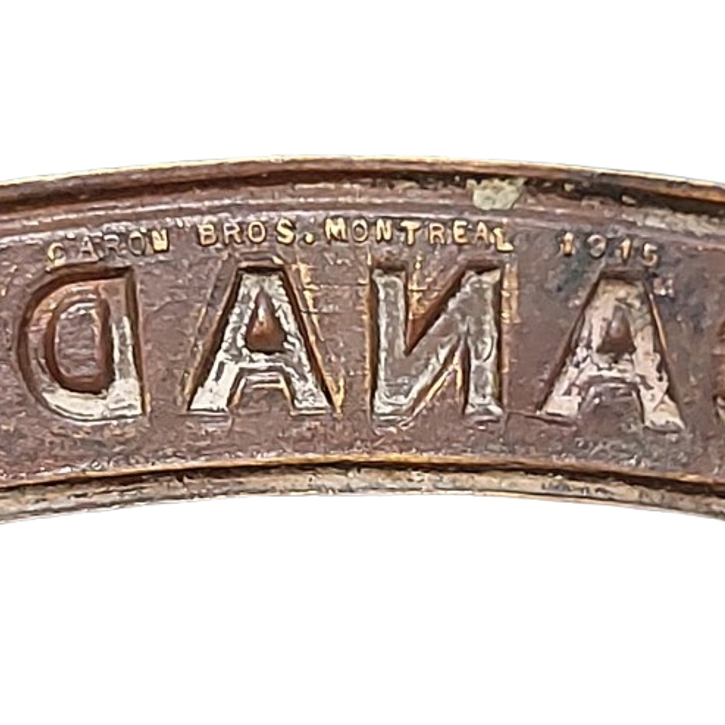 WW1 Canadian CANADA Brass Shoulder Title Caron Bros. 1915