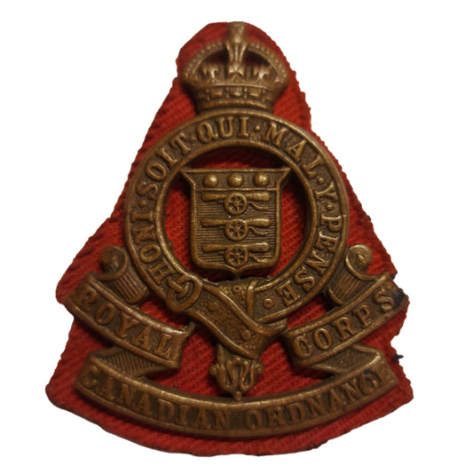 WW2 RCOC Royal Canadian Ordnance Corps Cap Badge With Canvas Backing.