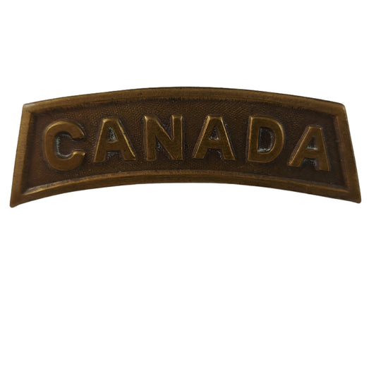 WW1 CANADA Brass Shoulder Title - Caron Bros. 1915